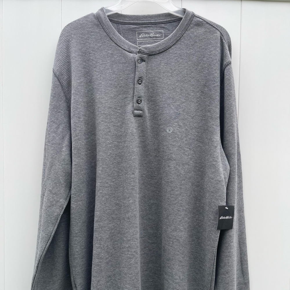 Long sleeve thermal crew neck shirt with 3 buttons.